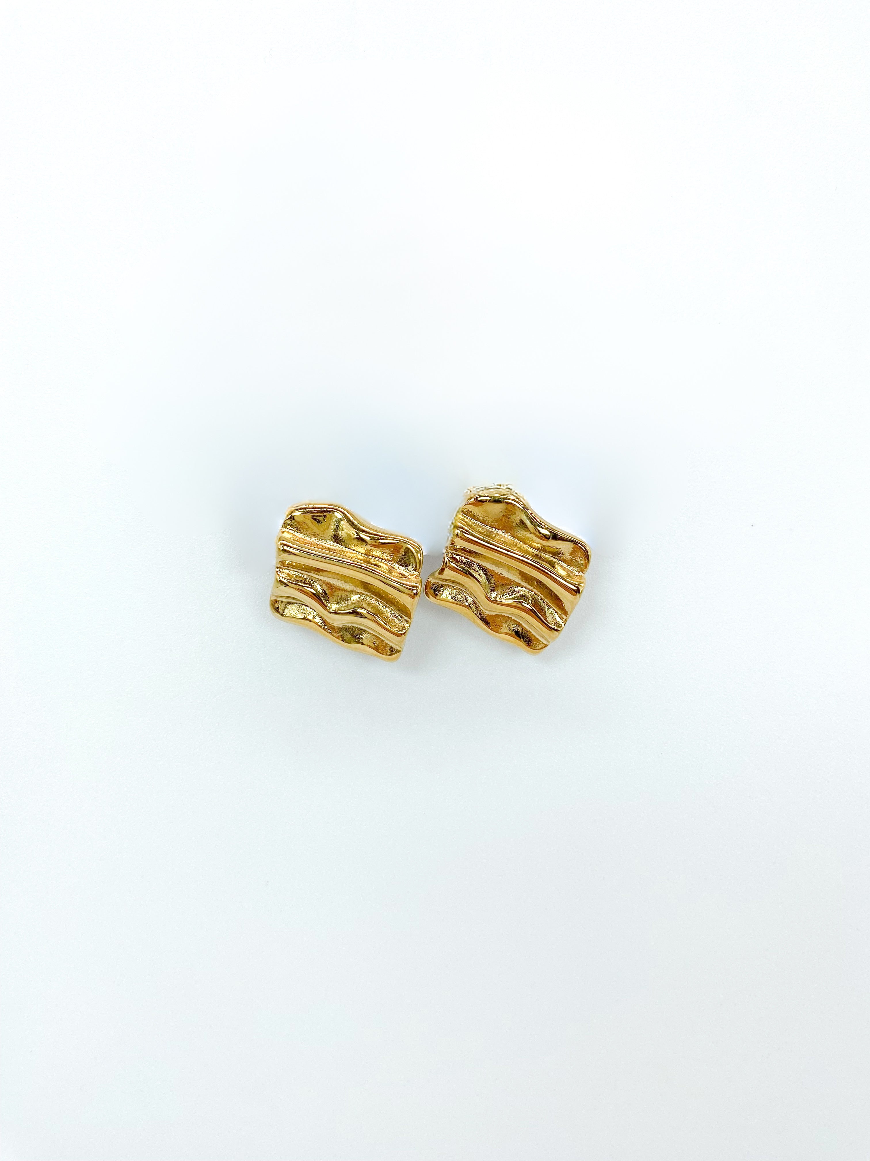 Aretes María